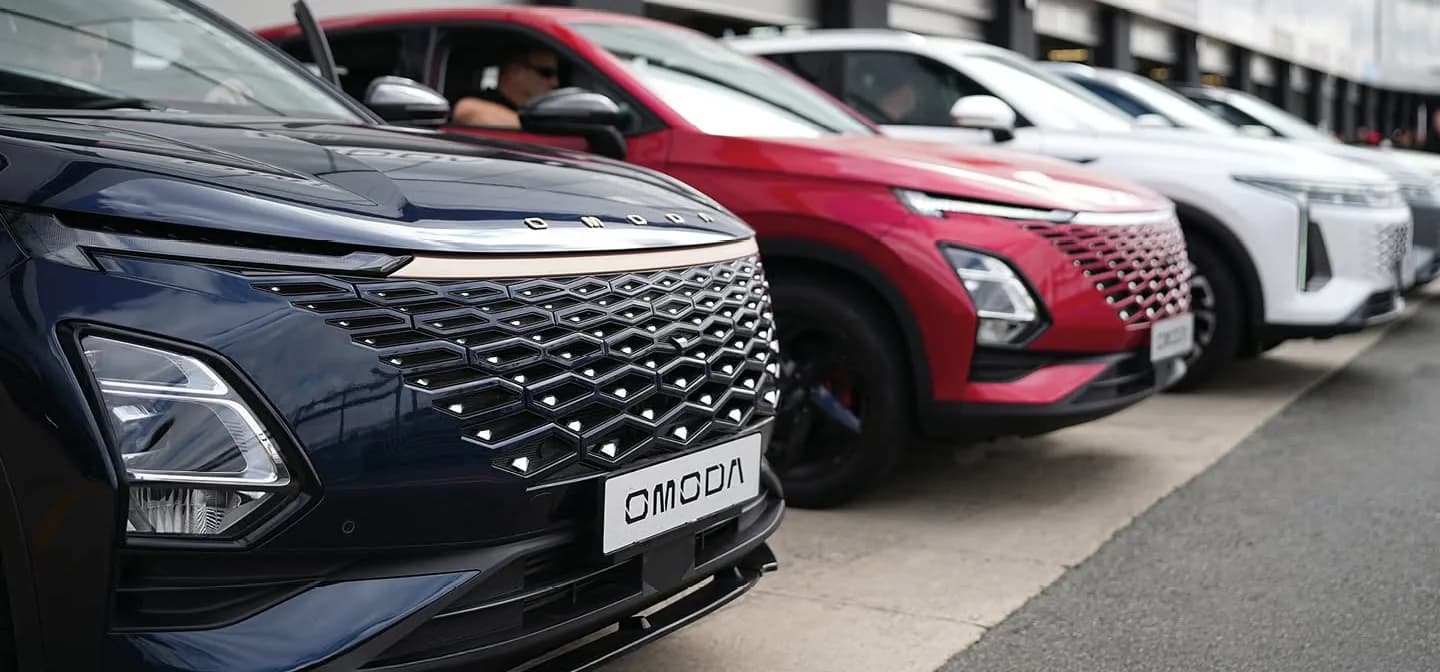 Three cars parked at Festival of Motoring